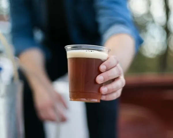 A beer being handed out
